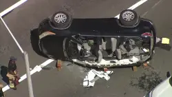 Elderly woman extricated from SUV that flipped after crash in Miami Beach